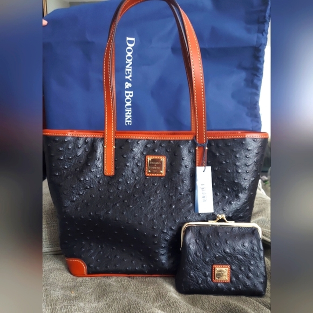 BRAND NEW DOONEY AND BOURKE